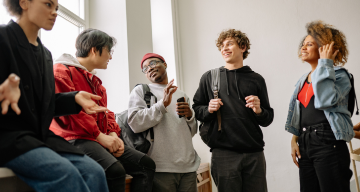 Students standing in the hallway talking