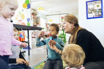 Child blowing a bubble
